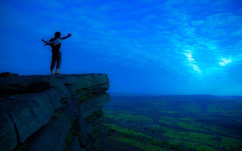 Person on Cliff Edge — Blue, Dramatic, Night, Photograph
