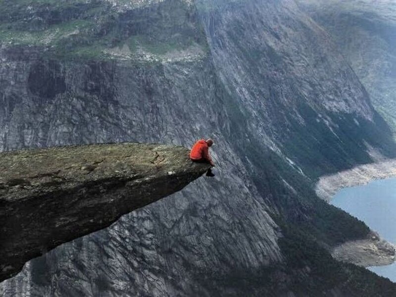 Person on Cliff Edge — Gray, Dramatic, Photograph, Mountain
