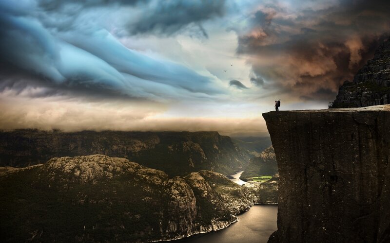 Person on Cliff Edge — Gray, Dramatic, Sunset
