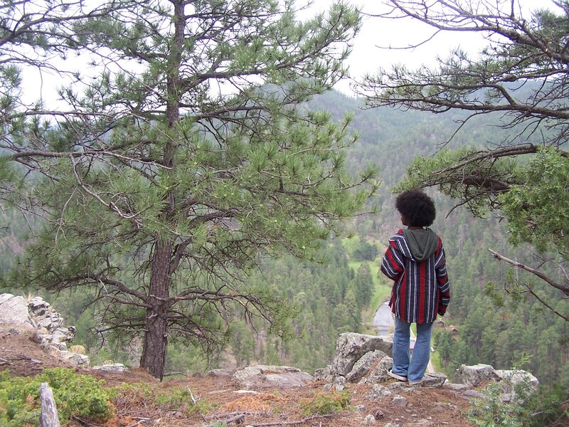 Person on Cliff Edge — Green, Serene