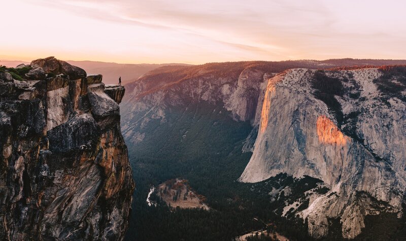 Person on Cliff Edge — Orange, Serene