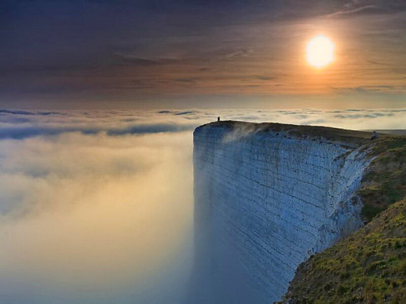 Person on Cliff Edge — White