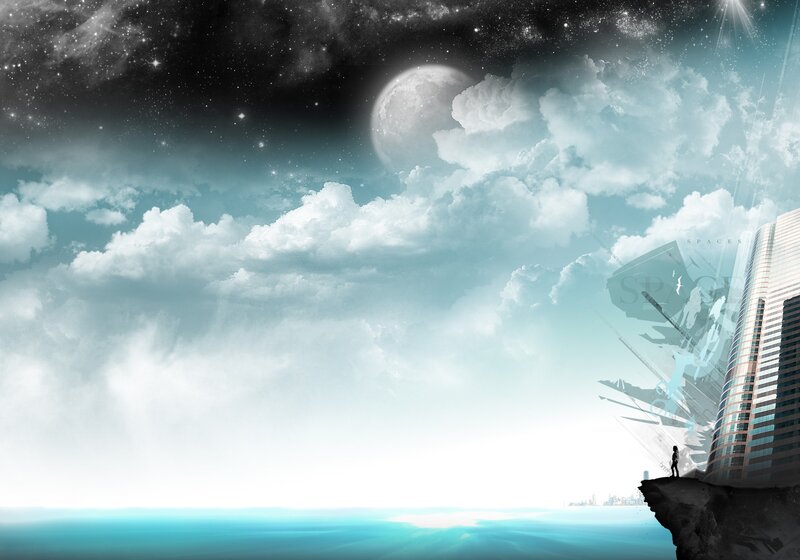 person on cliff overlooking sea