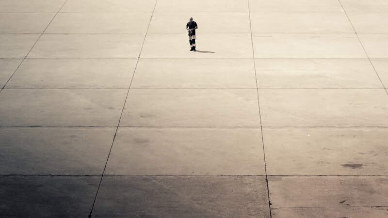Person on Concrete Surface