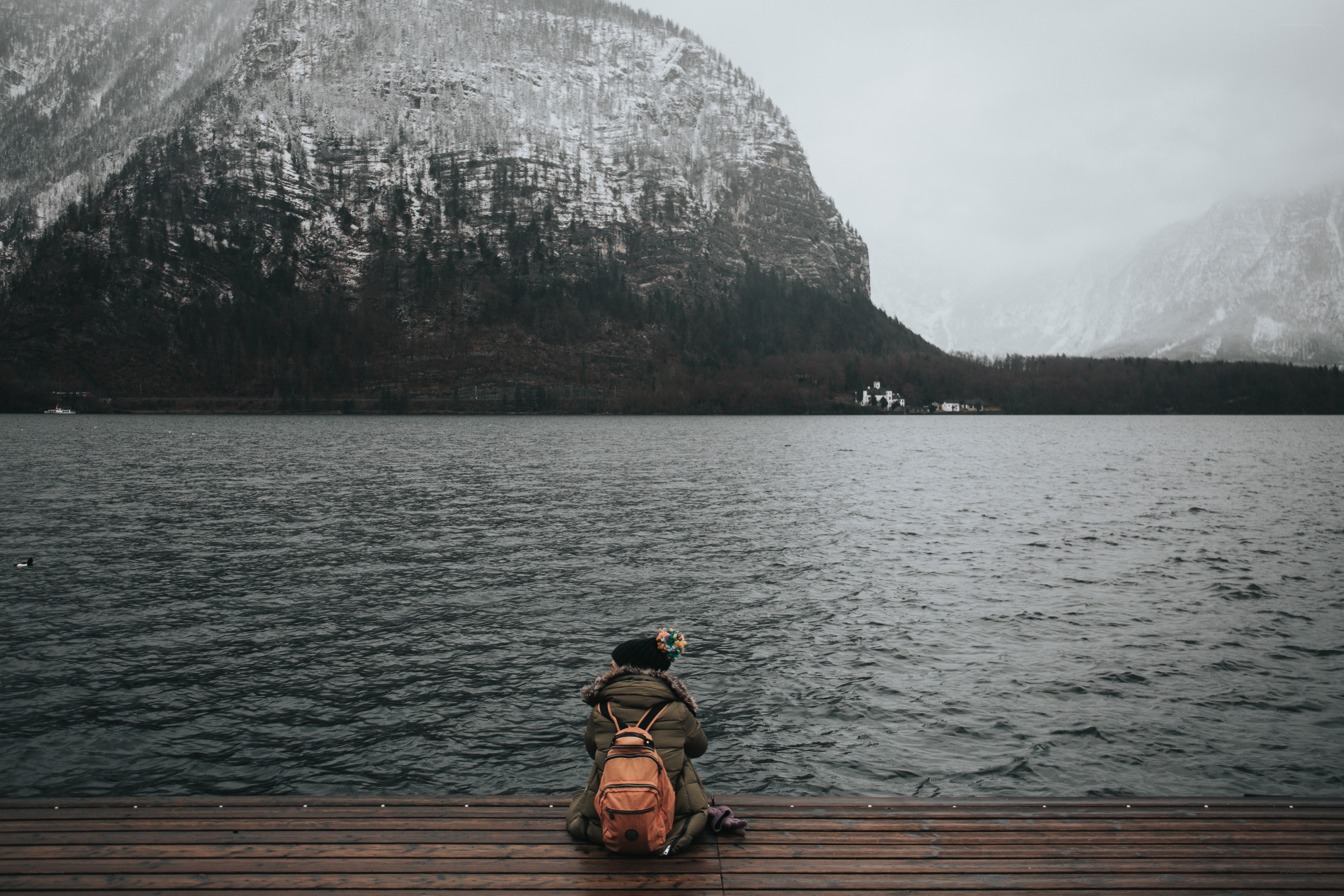 Person on dock by lake