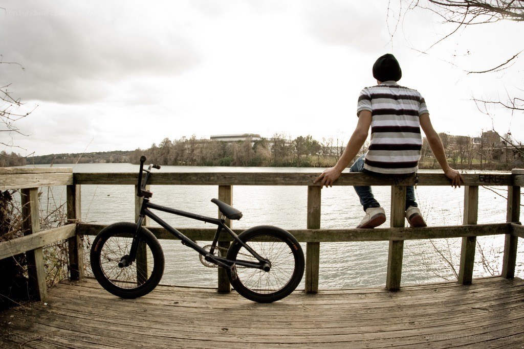 Person on dock with bike