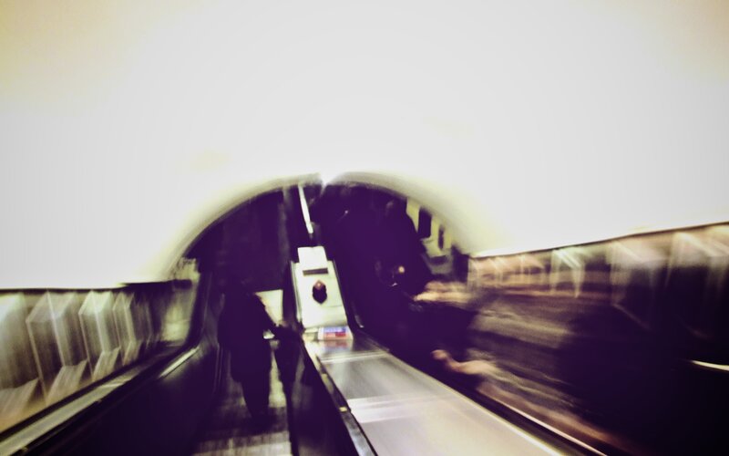 Person on Escalator — White