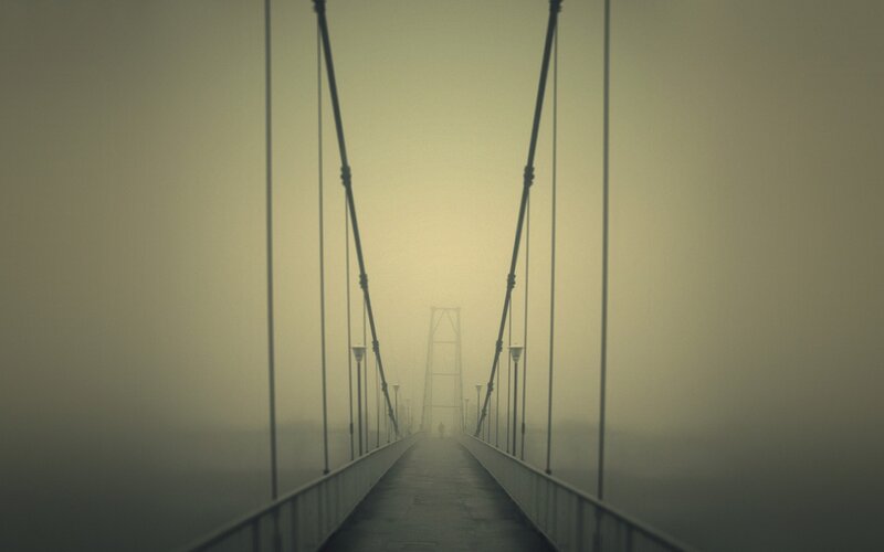 Person on Foggy Bridge — Gray, Misty, Morning