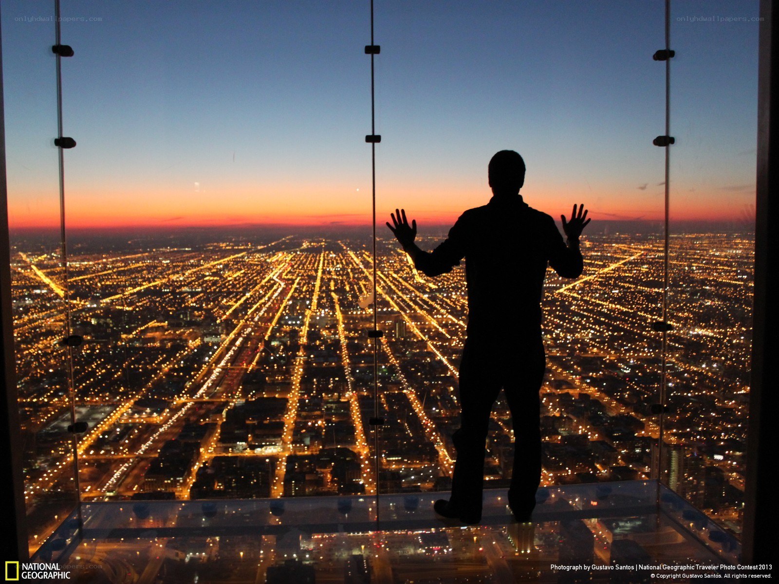 Person on glass observation deck
