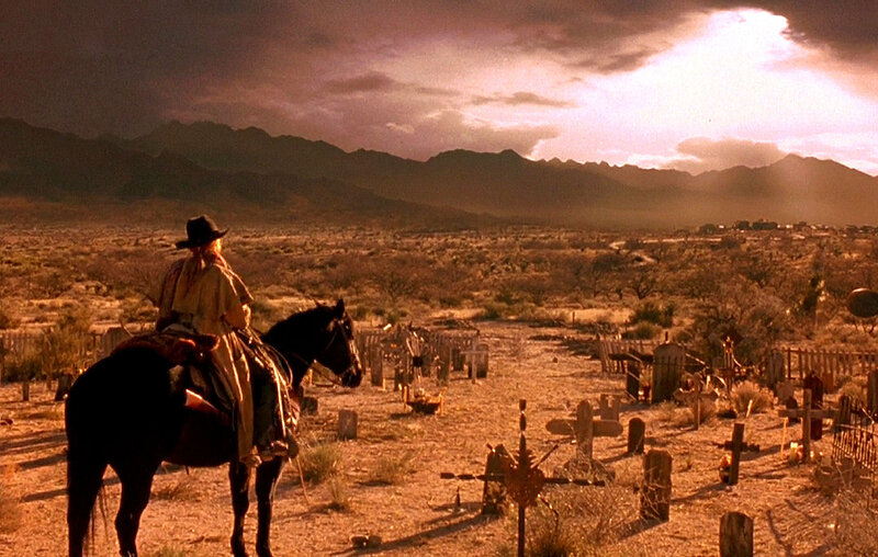 Person on Horse in Cemetery
