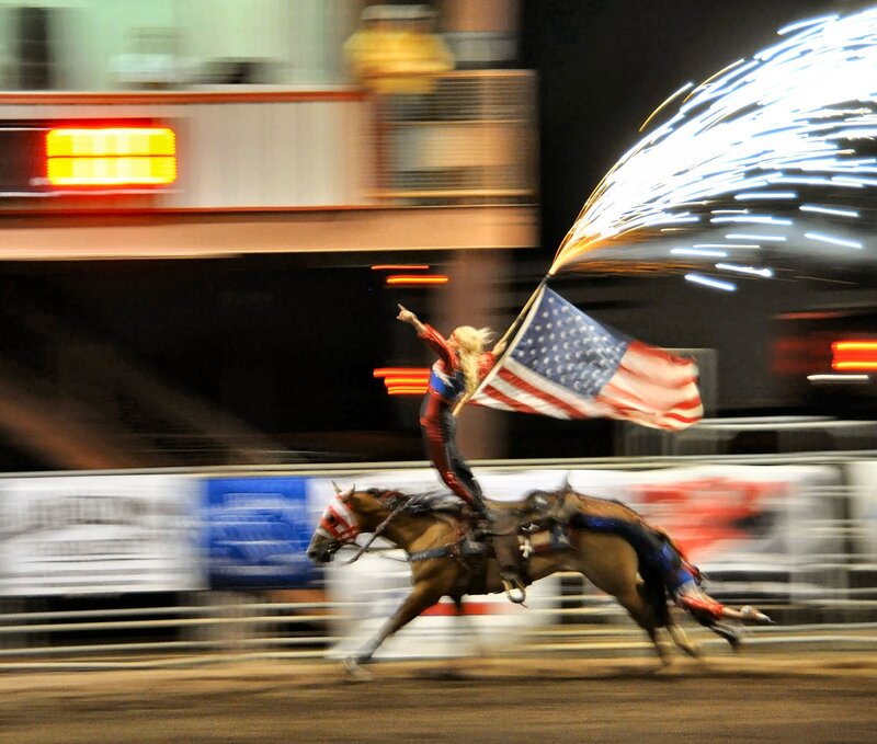 Person on Horse with Flag — Brown