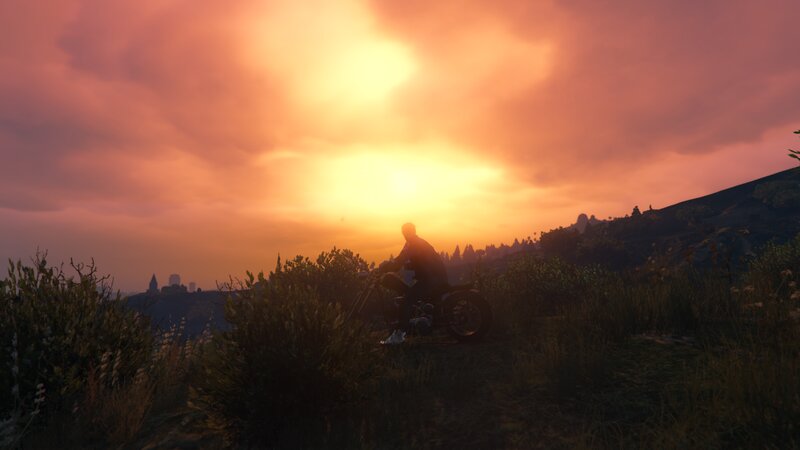 Person on Motorcycle — Orange, Serene, Sunset