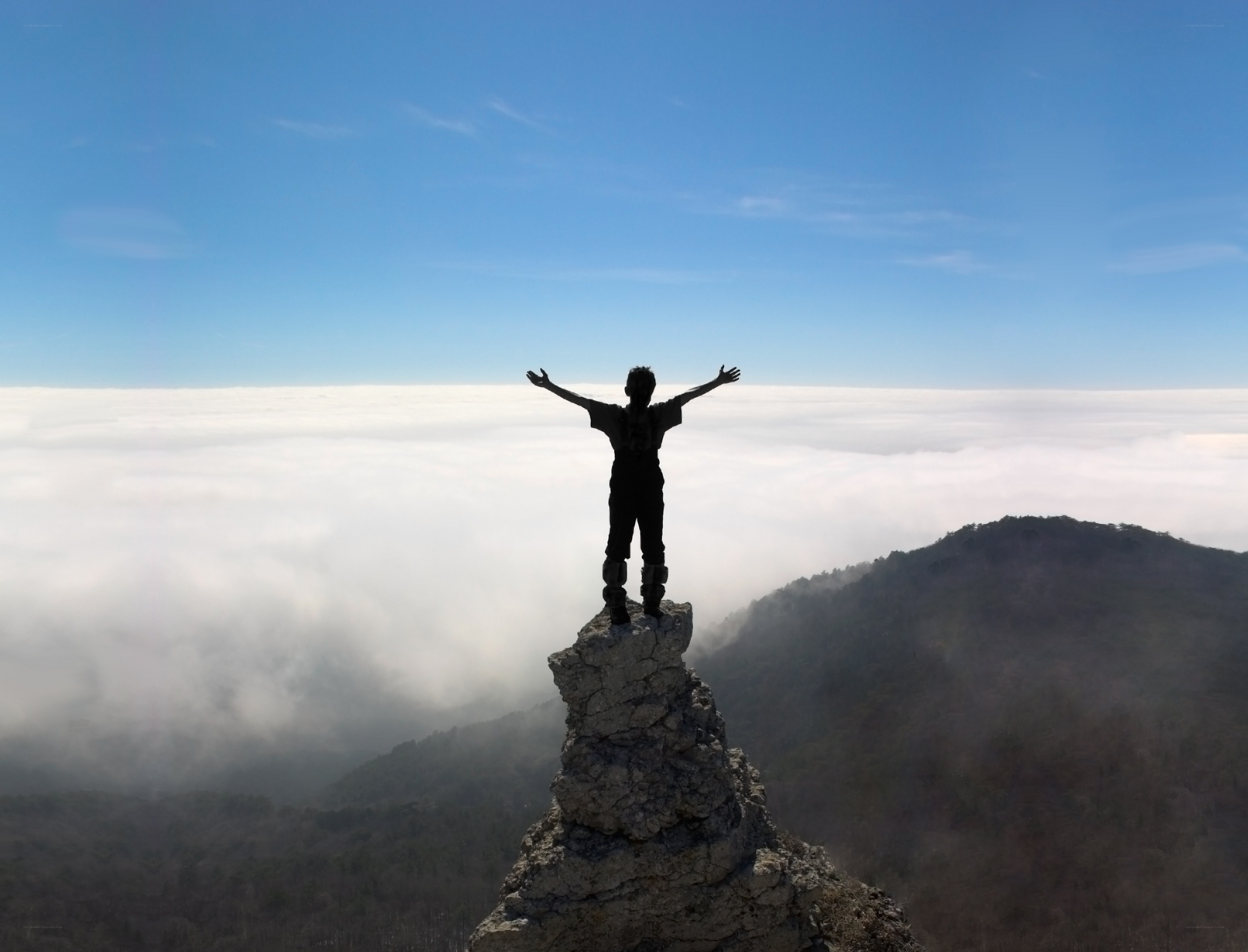 Person on mountain peak