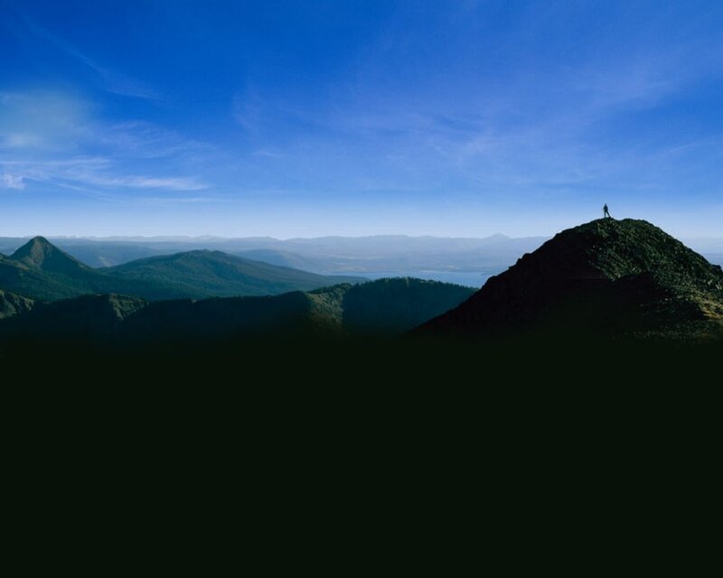 person on mountain peak