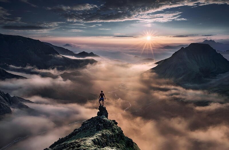 Person on Mountain Peak — Blue, Dramatic, Sunrise, Photograph