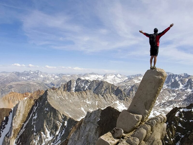Person on Mountain Peak — Blue, Serene, Afternoon