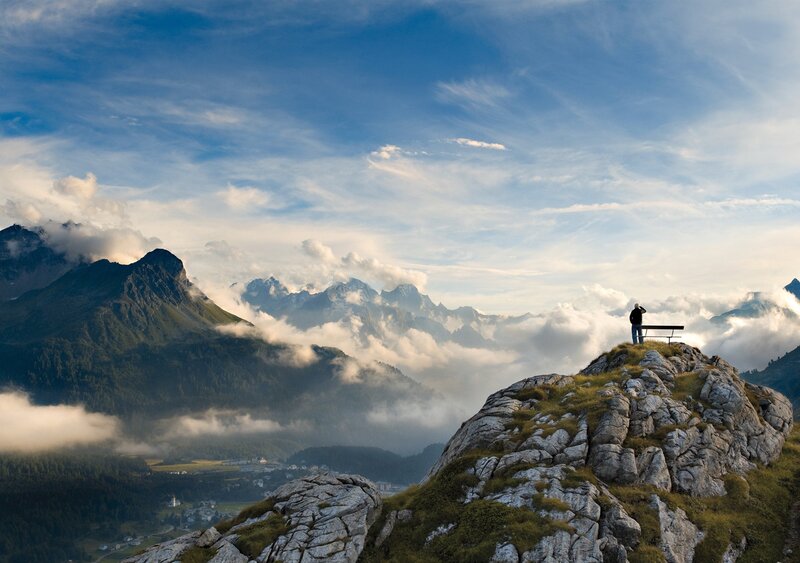 Person on Mountain Peak — Blue, Serene, Morning, Photograph, Mountains, Clouds, Bench