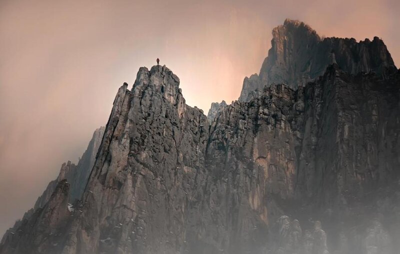 Person on Mountain Peak — Gray