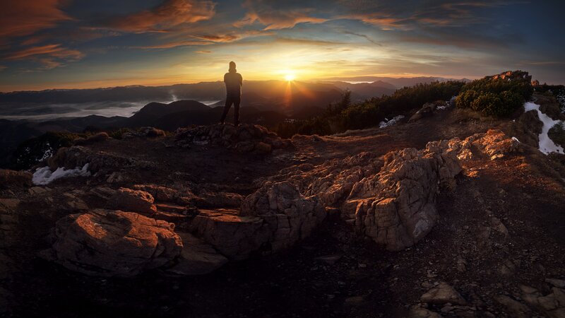 Person on Mountain Peak — Orange, Dramatic