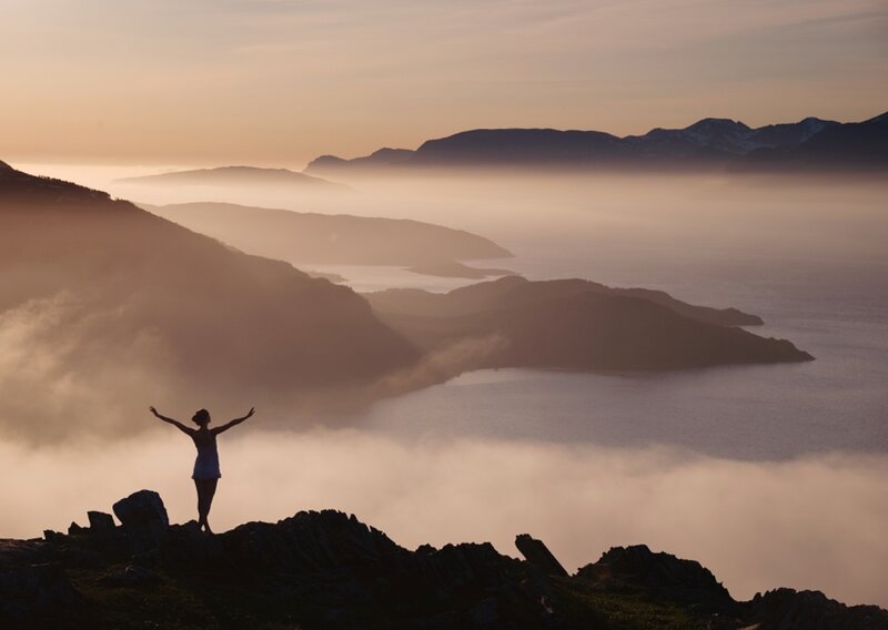 Person on Mountain Peak — Orange, Serene