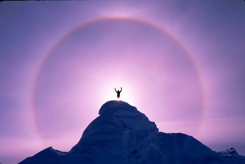 Person on Mountain Peak — Purple