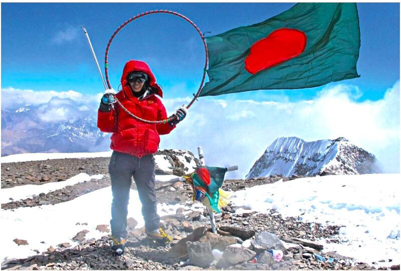 Person on Mountain Peak — Red