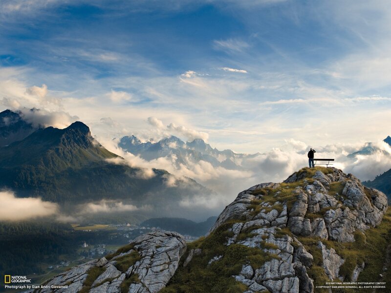 Person on Mountain Peak — Serene