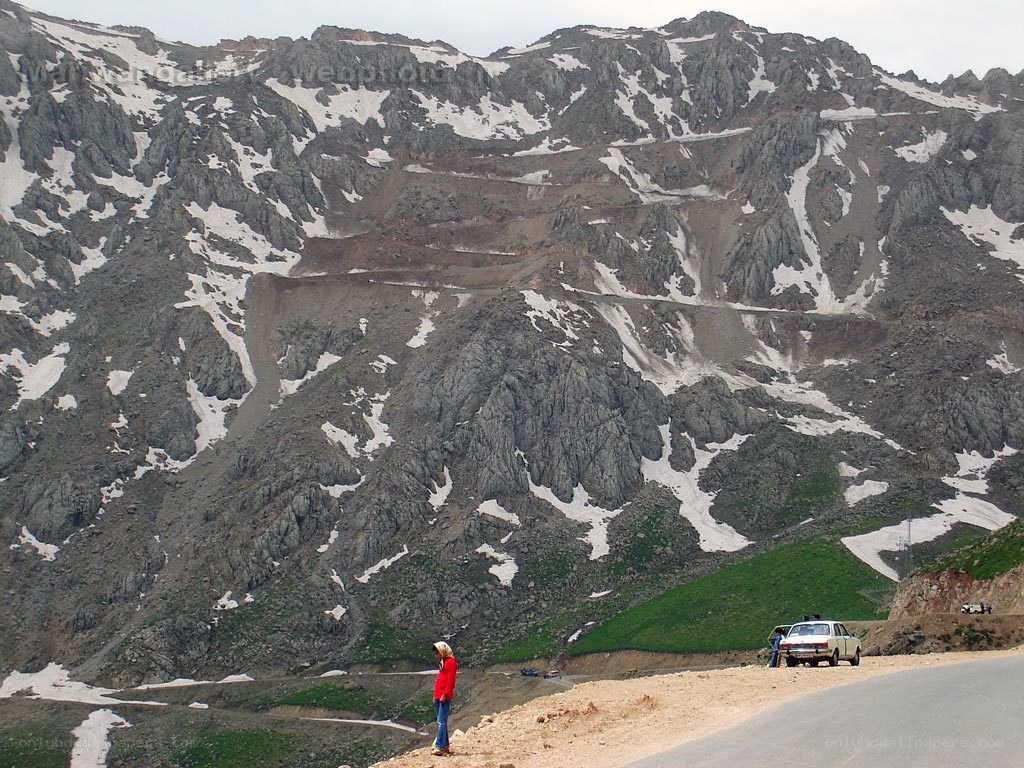 Person on mountain road