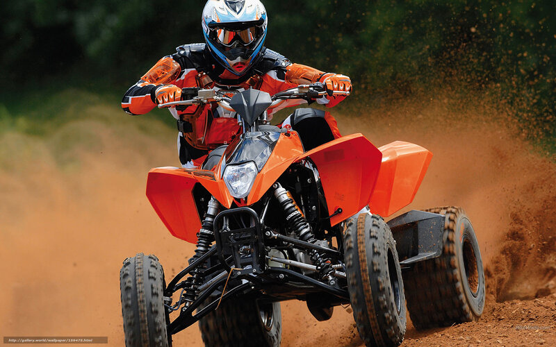 Person on Orange ATV — Dynamic, Afternoon, Photograph