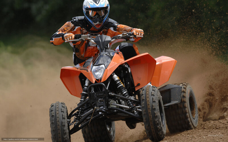 Person on Orange ATV — Dynamic, Photograph, Dirt