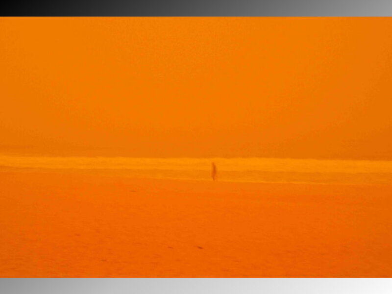 person on orange beach