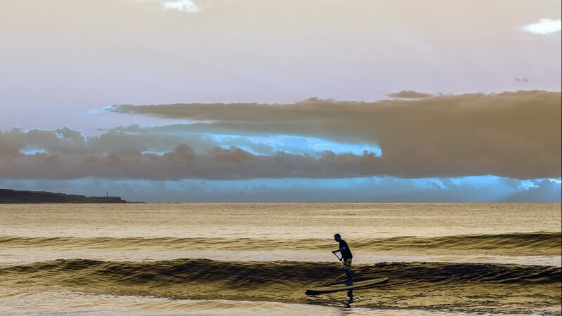 Person on Paddleboard — Gold