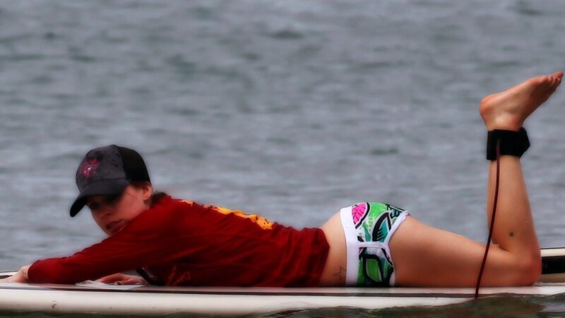 person on paddleboard in water