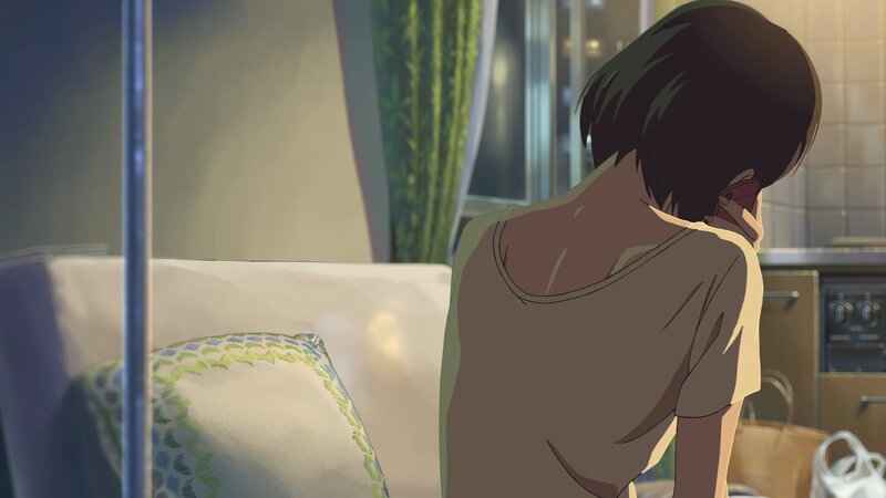 Person on Phone in Room