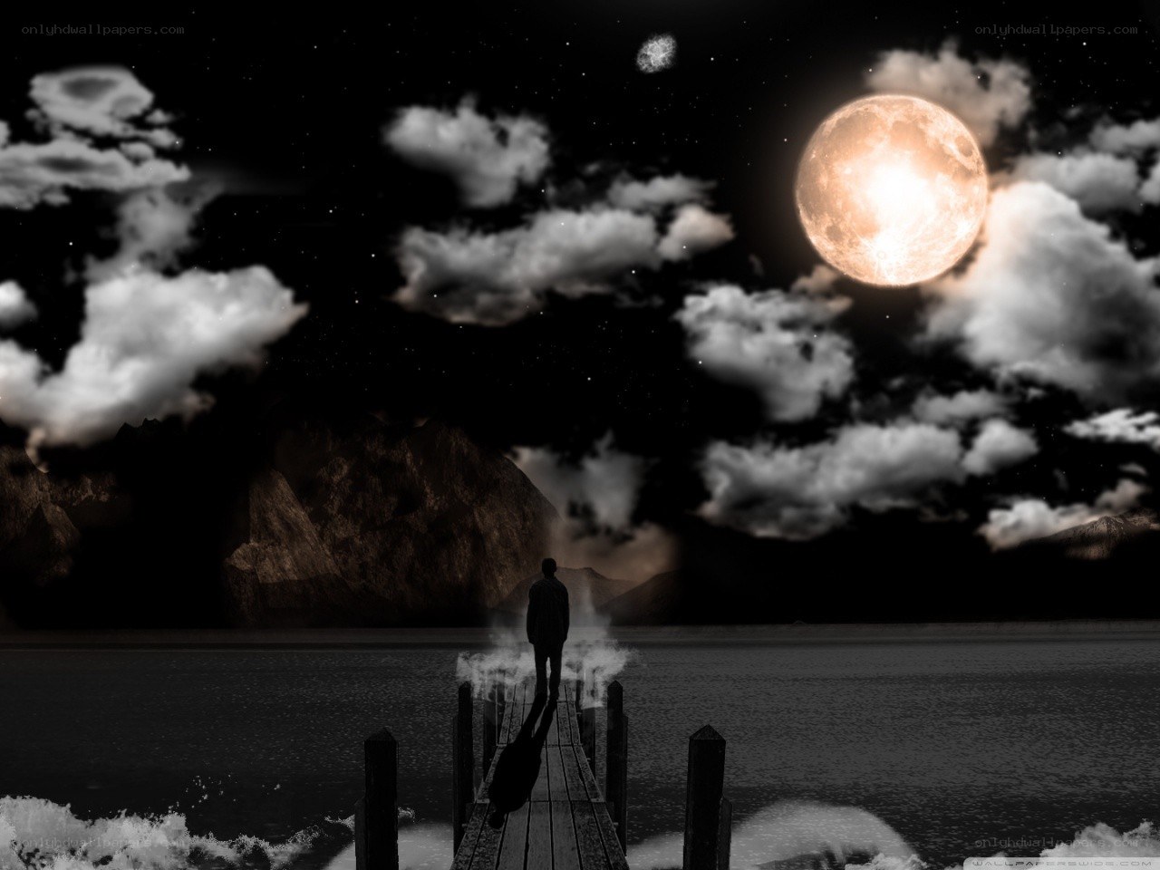 Person on pier at night