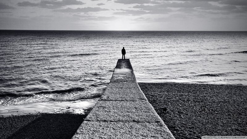 Person on Pier at Sea — Black