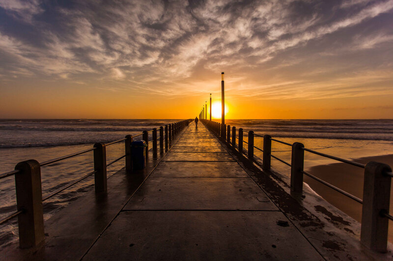 Person on Pier at Sunset — Orange, Dramatic, Photograph, Ocean
