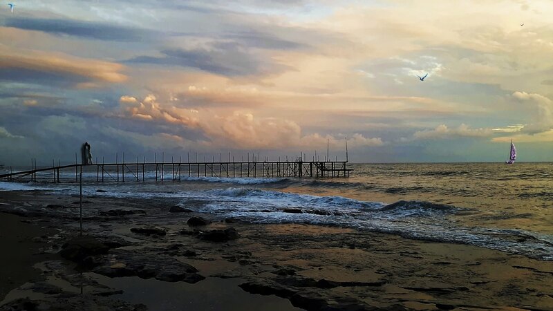Person on Pier at Sunset — Orange, Dramatic, Photograph, Sailboat