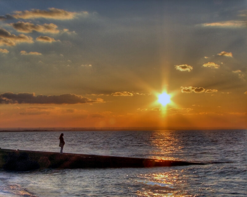 Person on Pier at Sunset — Orange, Dramatic, Photograph