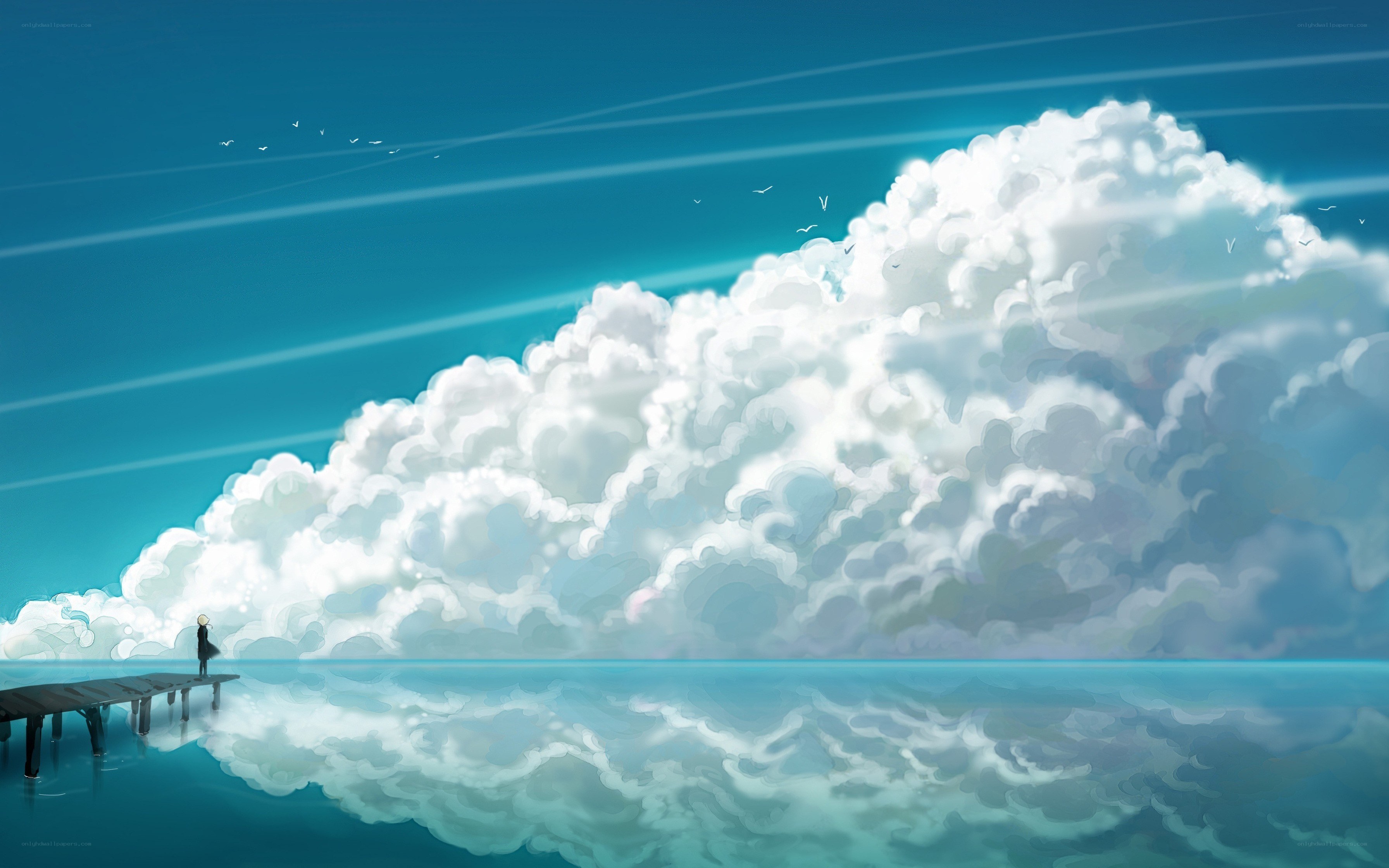 Person on pier with clouds