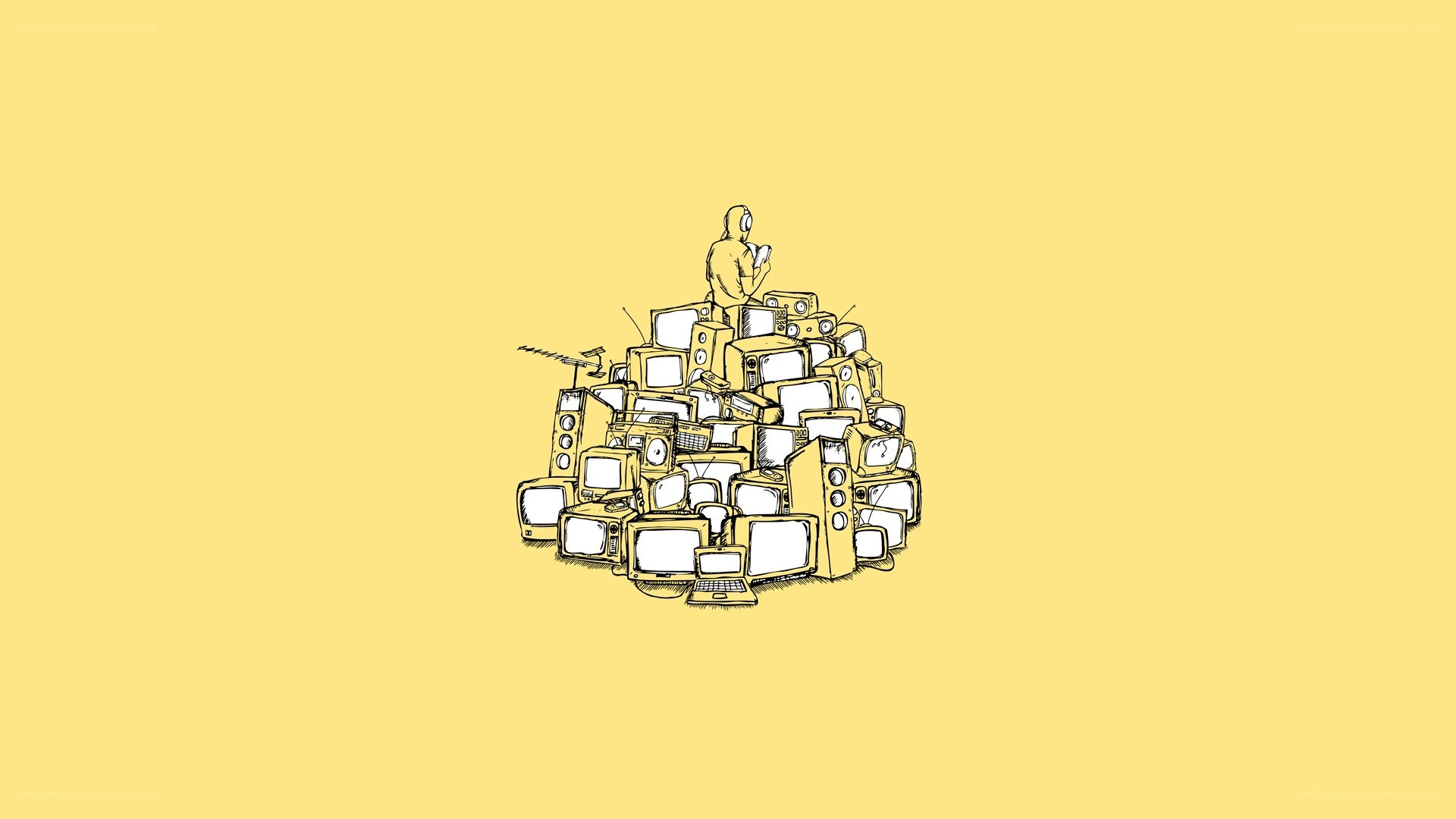 person on pile of electronics