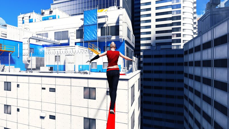 person on red beam in city