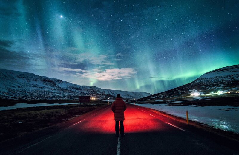 Person on Road at Night — Green