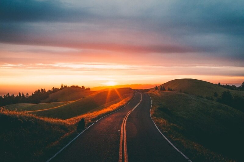 Person on Road at Sunset