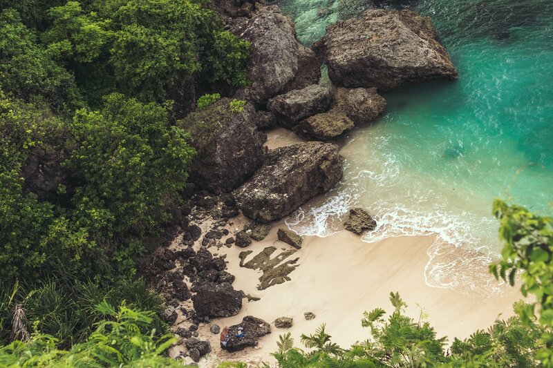 Person on Rocky Beach — Green, Serene