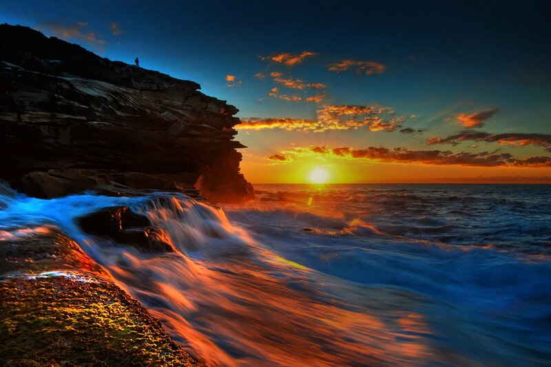 Person on Rocky Cliff — Blue, Dramatic