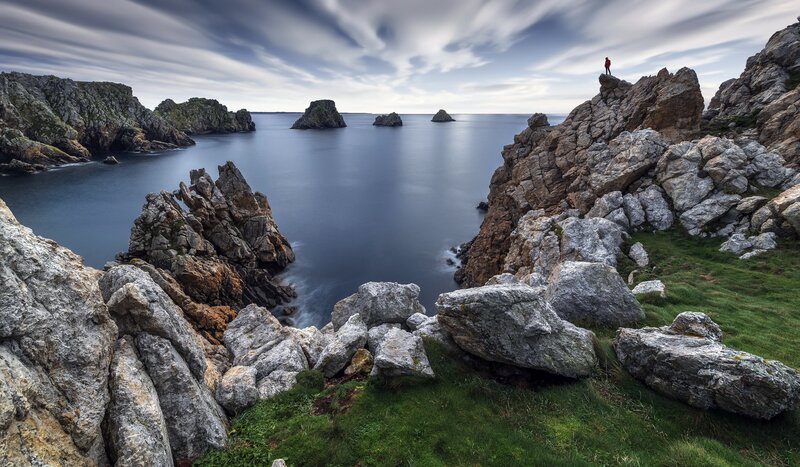 Person on Rocky Cliff — Gray, Dramatic, Morning