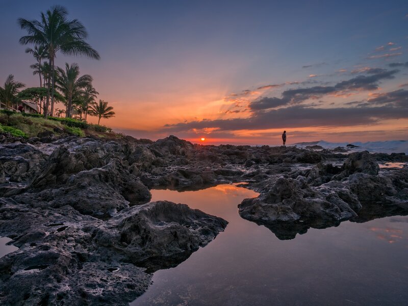 Person on Rocky Shore — Orange, Serene