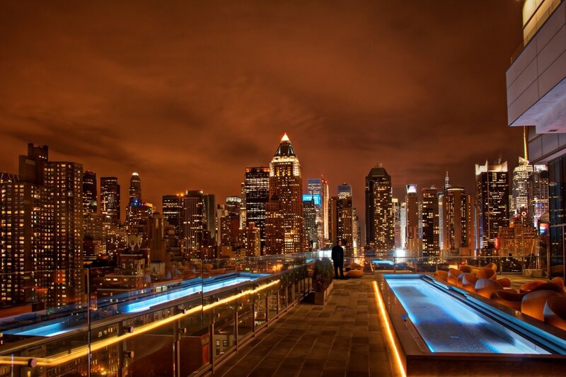 Person on Rooftop Deck — Orange