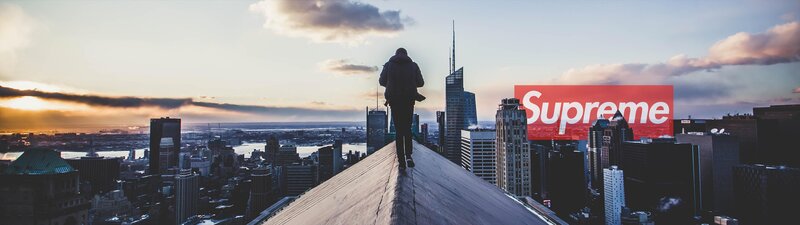 Person on Rooftop Edge — Blue, Dramatic, Sunset